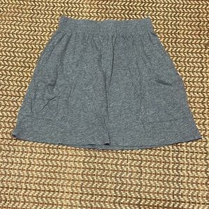 A gray skirt with pockets